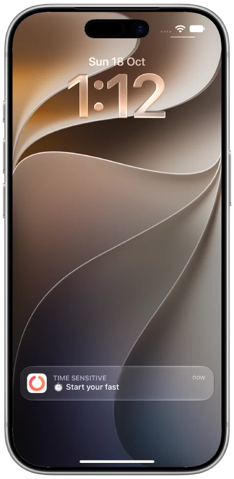 A real delivered Fasty notification on the iPhone Lock Screen saying Start your fast.