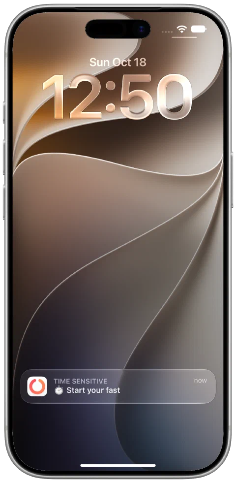 A real delivered Fasty notification on the iPhone Lock Screen saying Start your fast.