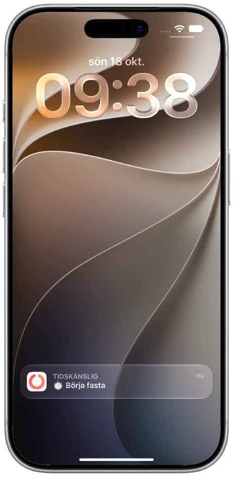 En verklig levererad Fasty-notis på iPhones låsskärm som påminner om att börja fasta.